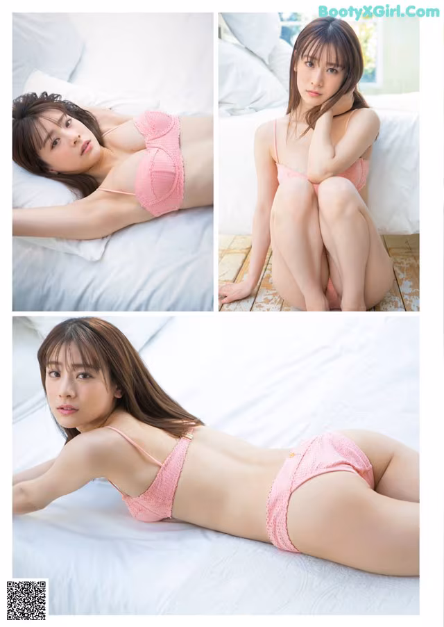 A woman in a pink bikini laying on a bed.